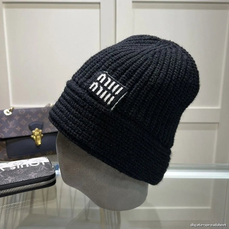White Miu Miu Ribbed Knit Beanie for Layered Winter Looks